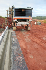 Concrete Paving machine on a road construction site