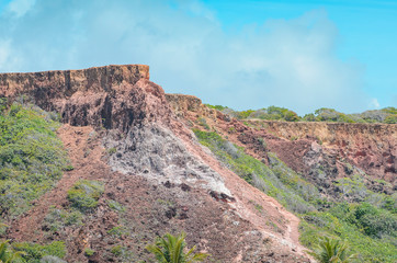 View of Mirante Dedo de Deus - God's finger belvedere viewed from Praia de Coqueirinho beach, Costa do Conde, Conde PB Brazil.
