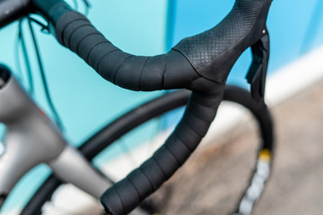 Road bike black shifterd located on bar integrated wirh brakes