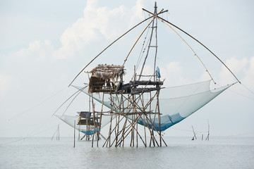 A giant square net fishing in the sea