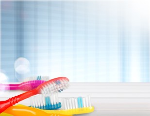 New Colorful Toothbrushes   on  Background