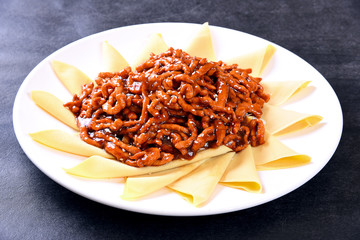 pasta with sauce and basil