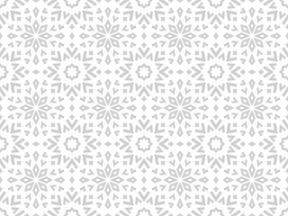 Abstract geometric pattern with lines, snowflakes. A seamless vector background. White and grey texture. Graphic modern pattern