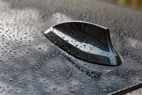 Closeup Of Water Droplets On A Car Fn Antena