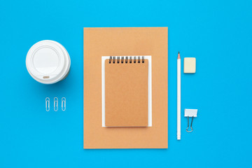 Assortment of office supplies and technology accessories , modern working table, top view