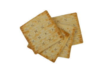 Cracker biscuits over white background. Selective focus