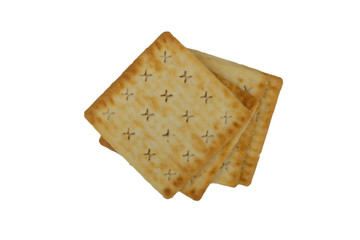 Cracker biscuits over white background. Selective focus