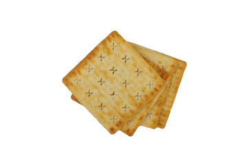 Cracker biscuits over white background. Selective focus