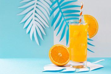 Orange juice in glass and fresh fruits