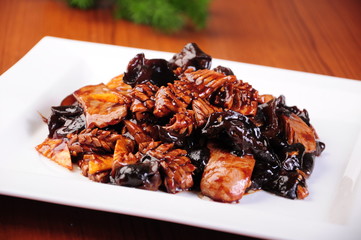 grilled meat and vegetables on plate isolated on white
