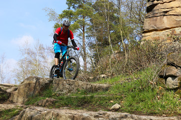 Mountain biker in difficult terrain