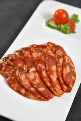 grilled sausages with potatoes and vegetables