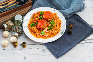 Stuffed tomatoes and rice with tomato