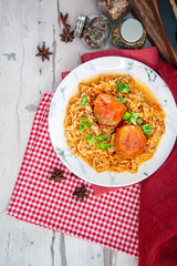 Stuffed tomatoes and rice with tomato