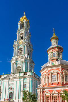 Chapel and Bell tower of Holy-Trinity St. Sergius Lavra against blue sky. Sergiyev Posad, Moscow region, Golden ring of Russia. UNESCO World Heritage Site