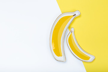 banana-like plate on yellow background