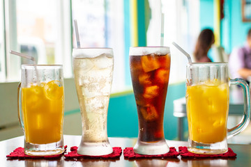 four glasses of drink