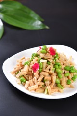 pasta with pesto sauce and basil
