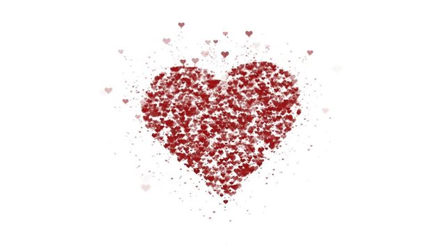Red heart is isolated on white background. Accumulation of little hearts creates one large heart. The whole heart is being zoomed. Close up. Copy space.