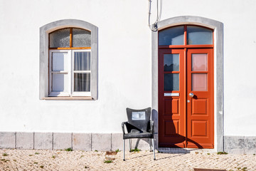 Fototapeta na wymiar Entrance to traditional portuguese fisherman's house in Algarve