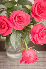 Beautiful lush red rose flower in full bloom