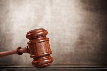 Justice Scales and books and wooden gavel on table. Justice concept