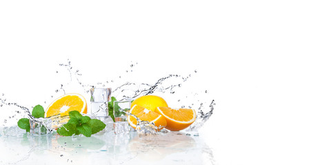 ice cubes, mint leaves with oranges isolated on a white background