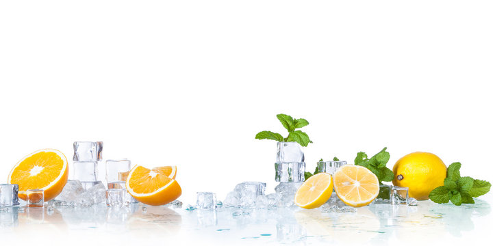 ice cubes, mint leaves with lemons isolated on a white background