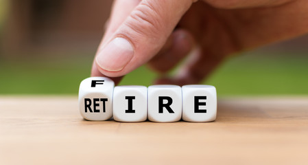 Retire or get fired. Hand turns a dice and changes the word "fire" to "retire".