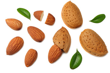 almonds with green leaves isolated on white background. top view.