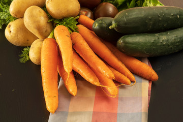 potatoes, carrot, tomatoes, lettuce and cucumbers