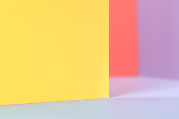 colored paper as fashion texture background in three color tone