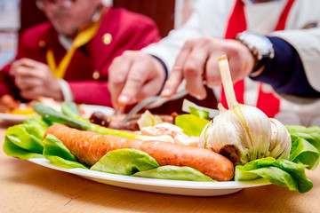 Traditional sausages are arranged for review at food contest