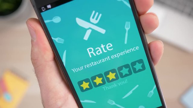 Rating 3 stars a restaurant on a smartphone rating app