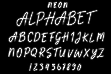 Fototapeta na wymiar White Alphabet Neon Type On Black Background