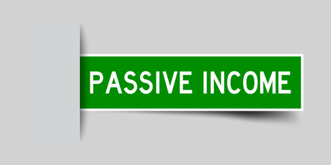 Square seal green color sticker in word passive income insert on gray background