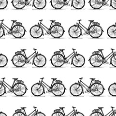 Obraz premium Seamless background of sketches of bikes