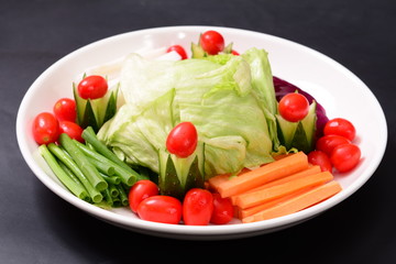 fresh vegetable salad with tomatoes and mozzarella