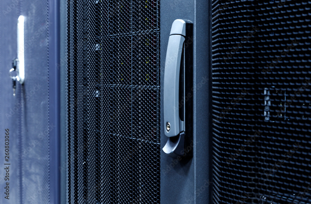 Aufkleber technological background with close up grid closed doors in data center.