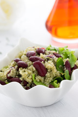 Qinoa salad with mexican beans on white background