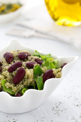 Kinoa salad with mexican beans on white background