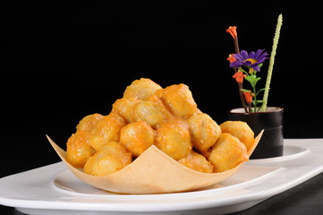 fried potatoes on white plate