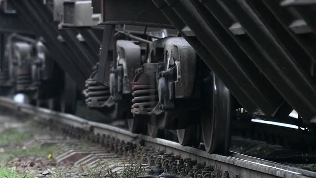 Train wheel close up on railway track. Slow motion