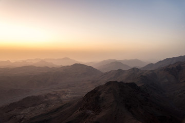 Middle East or Africa, picturesque bare mountain range and a large sandy valley desert landscapes landscape photography