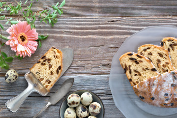 Easter Bread (Osterbrot in German). Top view of traditional fruty bread on rustic wood with fresh...