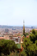 Deurstickers Aerial view of Barcelona from Park Güell with The Gaudi House Museum in the foreground. © jelena990