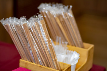 New Japanese chopsticks in a package in a Japanese restaurant.