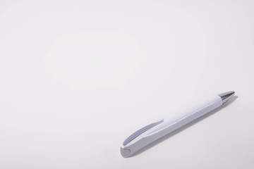 Concept of idea and writing. White pen on white background.