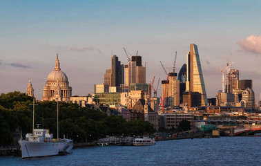 Fototapeta premium The view of London's city hall and modern skyscrapers at sunny day.