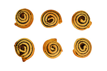 Baked cookies with raisins and poppy seeds isolated on white background.